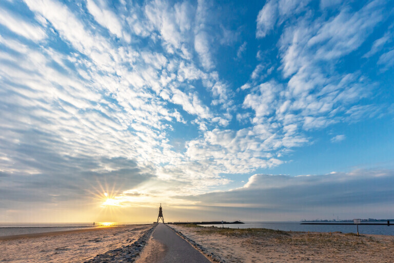 Wolkenspiel über der Kugelbake